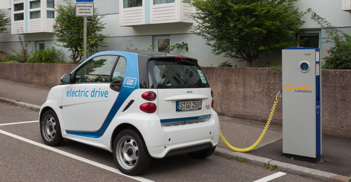 EnBW electric car charging station in Stuttgart with a 3rd generation Smart electric car of carsharing company Car2Go