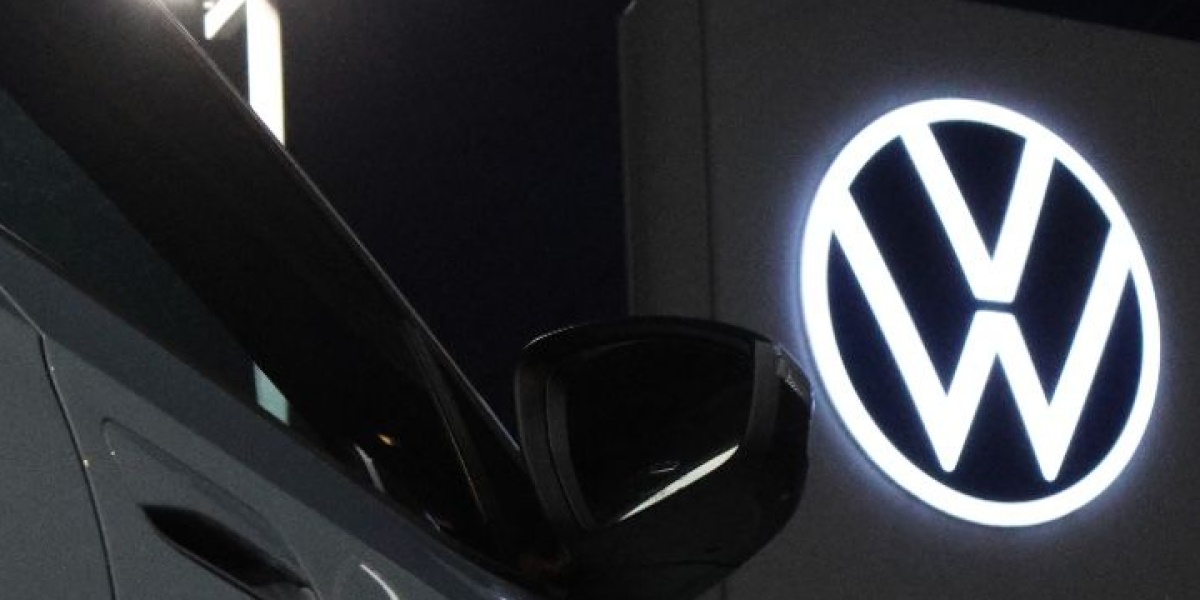 Bright Volkswagen Dealership at Night Seattle, WA by Darren Mael