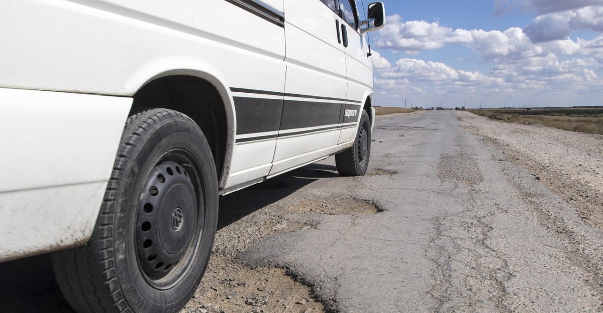 pothole road kazakhstan hole asphalt repair infrastructure volkswagen van life pothole pothole pothole pothole pothole