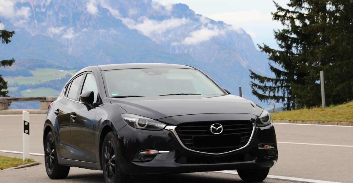 mazda mazda 3 automobile vehicle dare mountains nature mountain road
