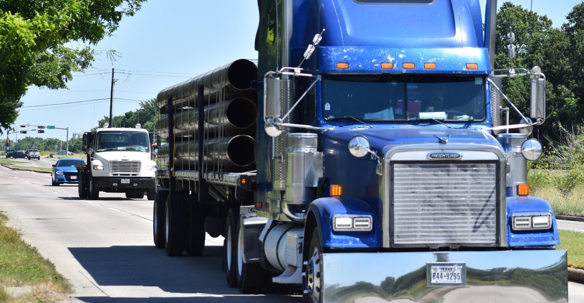 semi truck 18 wheeler truck transport moving goods shipping semi-truck trucking steel mill construction road driving highway haul freight trailer heavy 18 wheeler truck trucking trucking trucking trucking trucking
