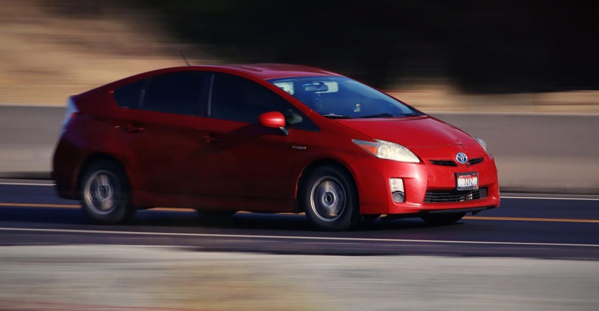 car toyota prius red automobile automotive travel fast drive road wheels highway speed traffic prius prius prius prius prius