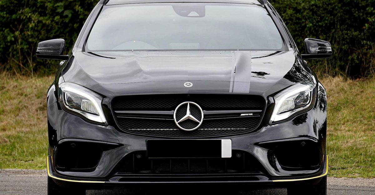 Luxurious black Mercedes-Benz AMG parked outdoors showcasing elegance and style