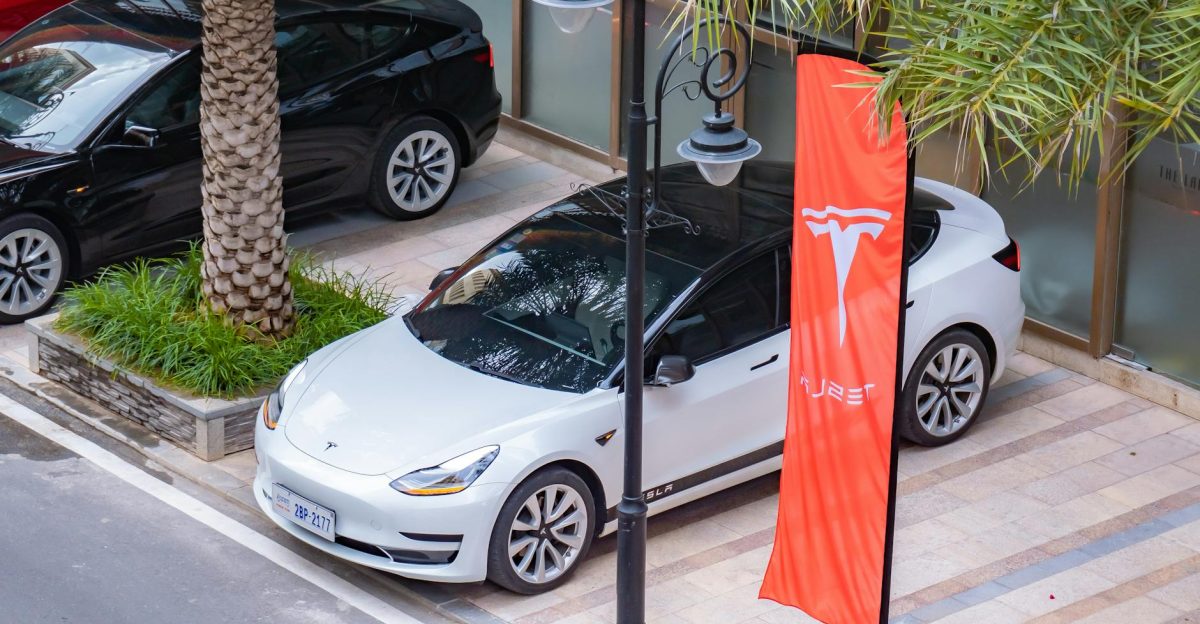 High-angle view of electric cars parked in an urban area showcasing sleek design and eco-friendly transportation