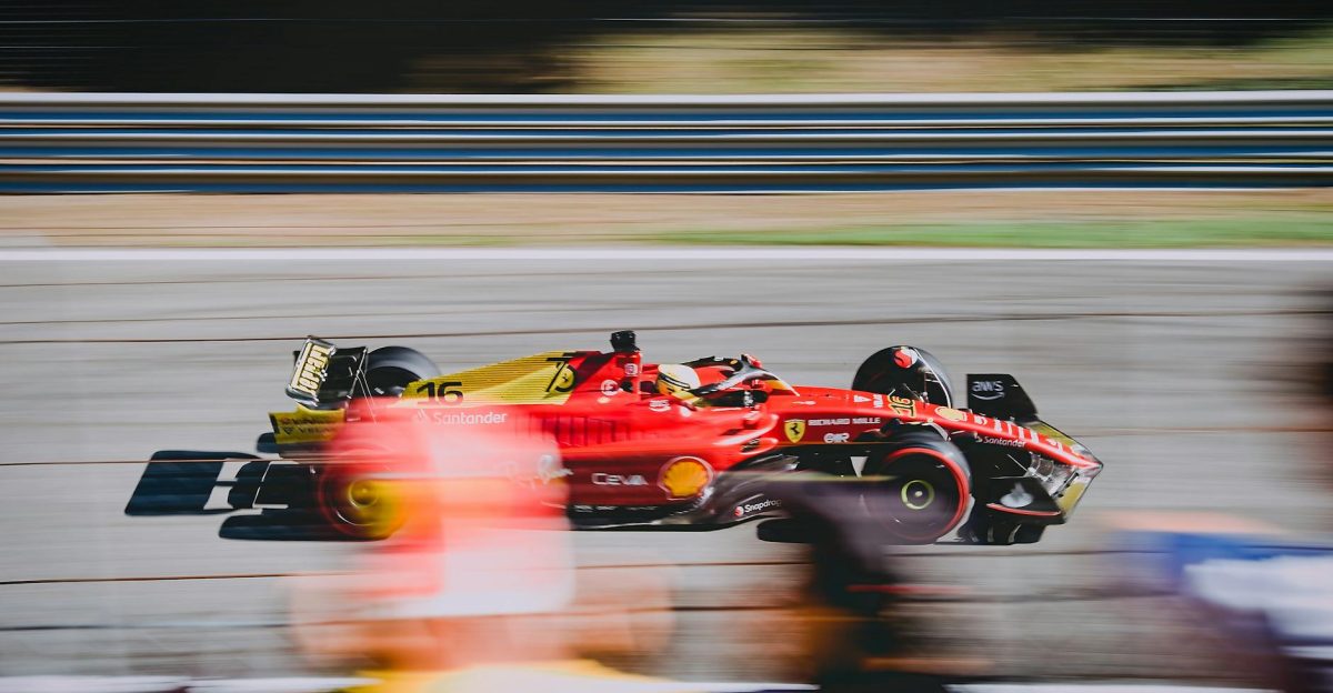A thrilling shot of a Ferrari on the race track during the Italian Grand Prix