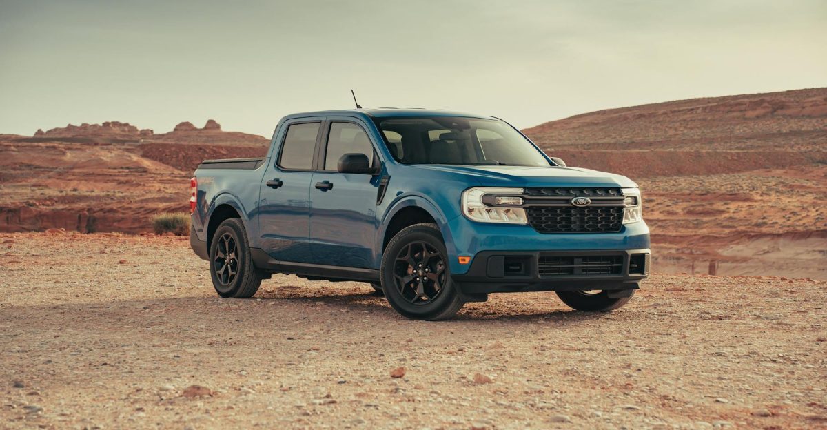 A blue Ford Maverick pickup truck in a serene desert landscape near Page Arizona