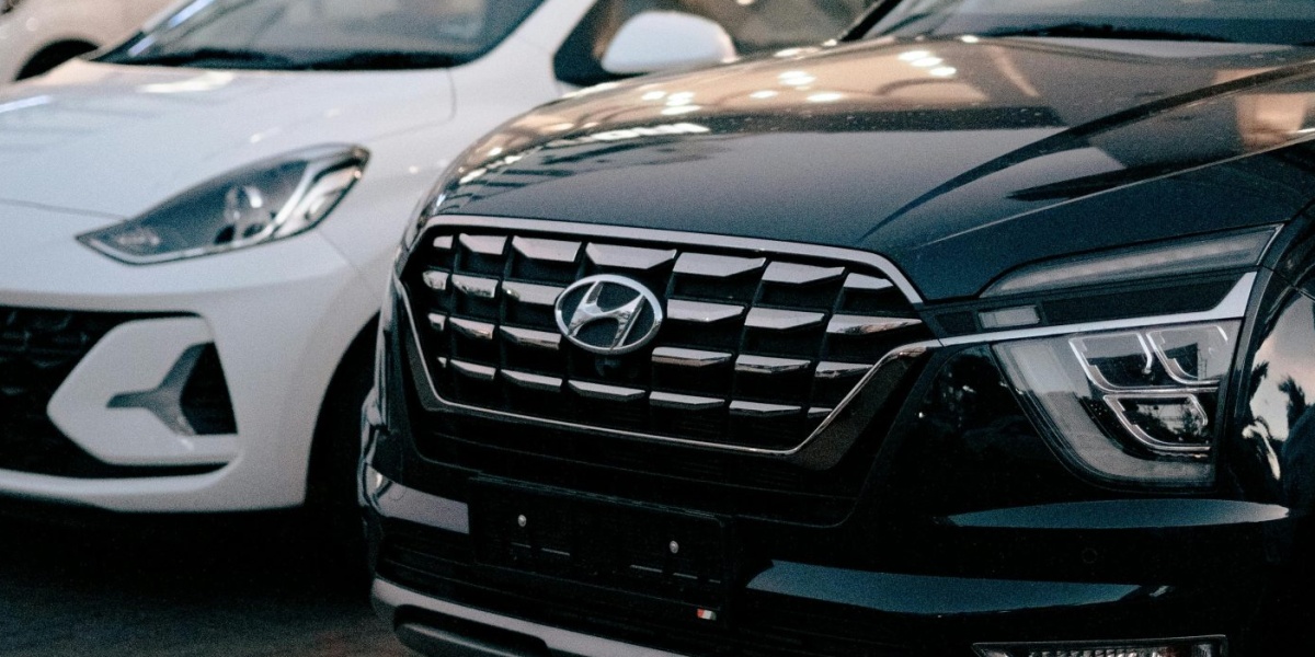New Hyundai SUVs parked outside a dealership in Kolhapur, India.