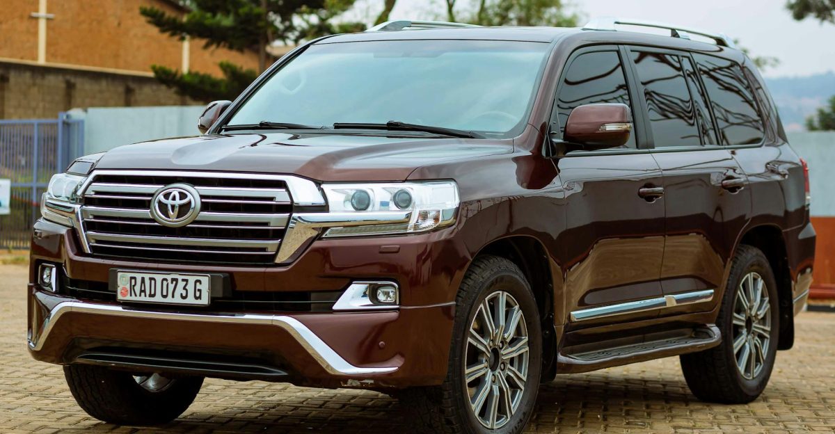 Elegant Toyota Land Cruiser parked on a cobblestone driveway during the day