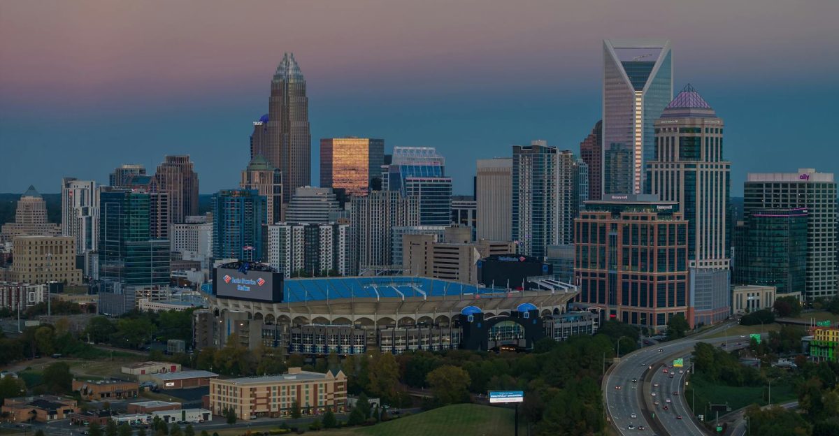 Aerial view of Charlotte skyline and Bank of America Stadium at dusk North Carolina USA