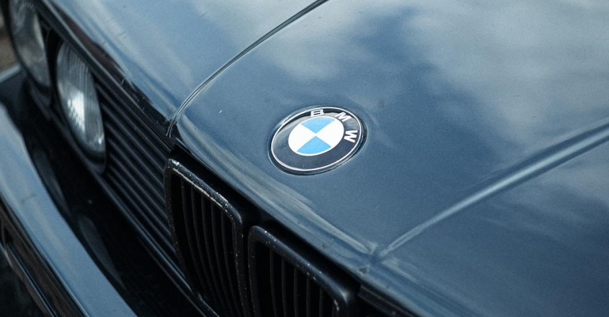 Close-up shot of a classic BMW E30 M3 grille highlighting its iconic design and luxury appeal