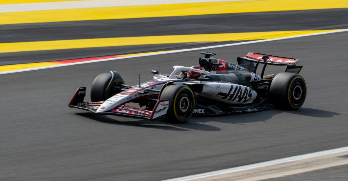 Rapid Formula 1 car speeding on a colorful track in Belgium