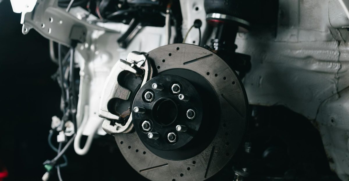 Detailed view of a vehicle s disc brake system with caliper showcasing automotive technology