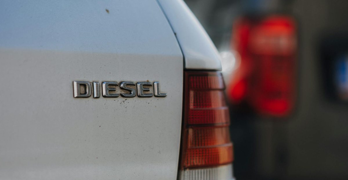 Detailed view of a diesel car badge with blurred background captured in Prague