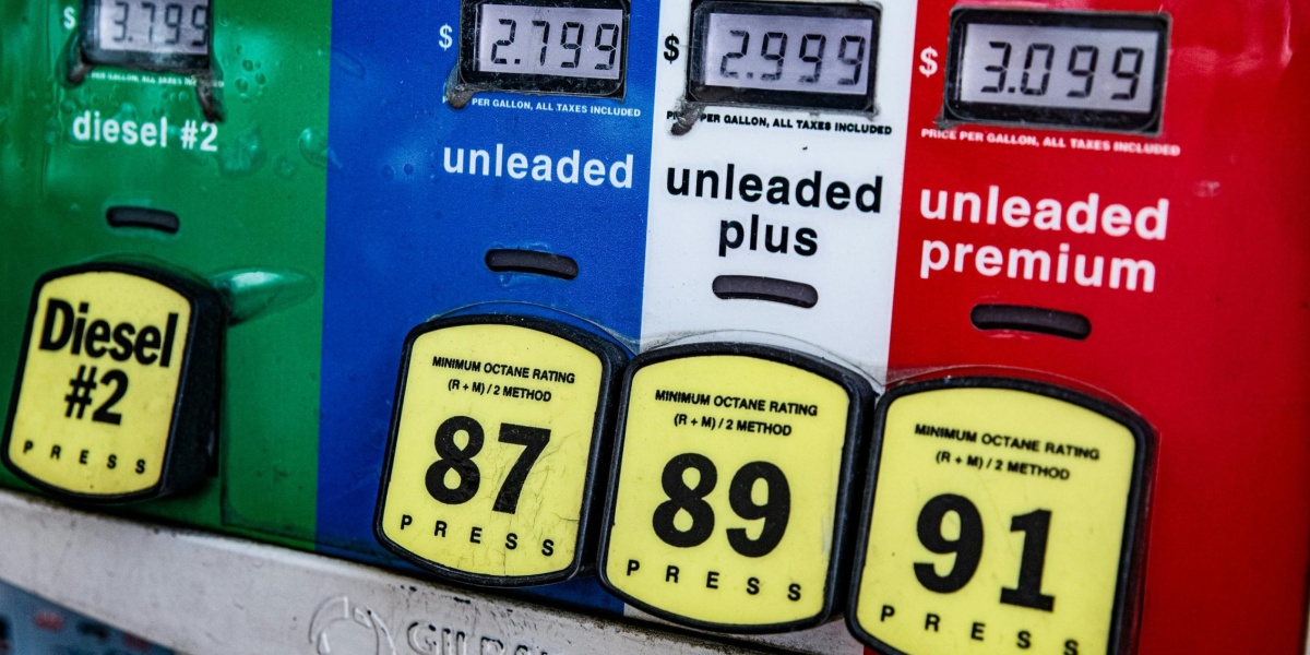 Close-up of a vintage gas pump station showing fuel prices and octane ratings in Los Angeles.