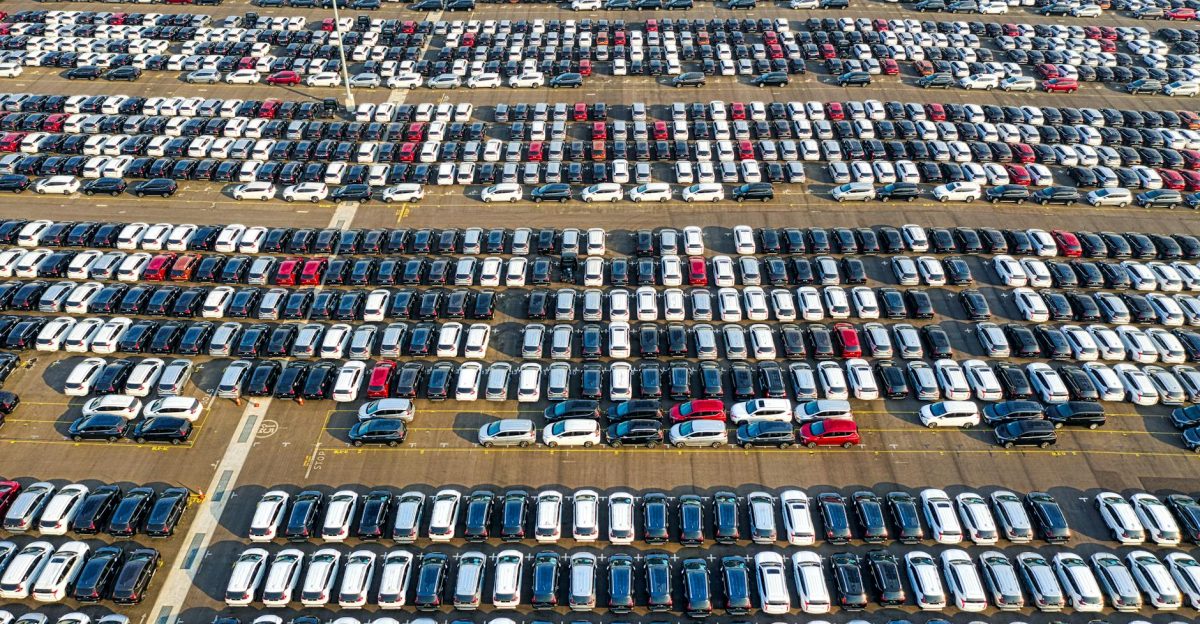 Aerial shot of a large car parking lot showing rows of various vehicles in Bekasi Indonesia