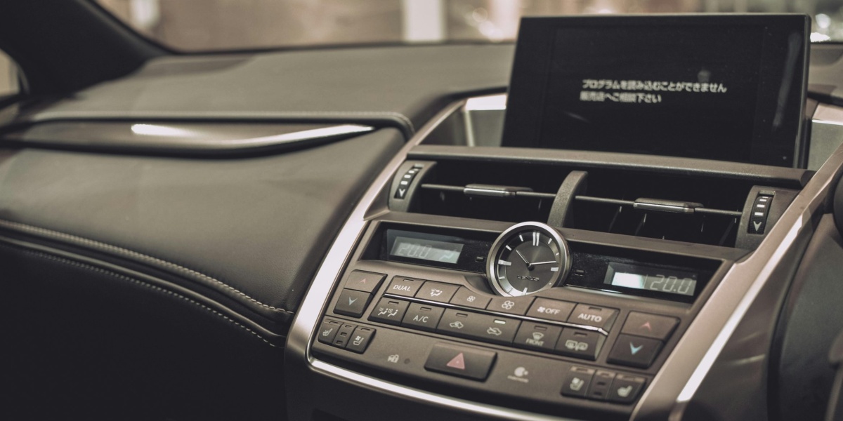 Close-up of a Lexus car interior showcasing the sleek dashboard and modern features.