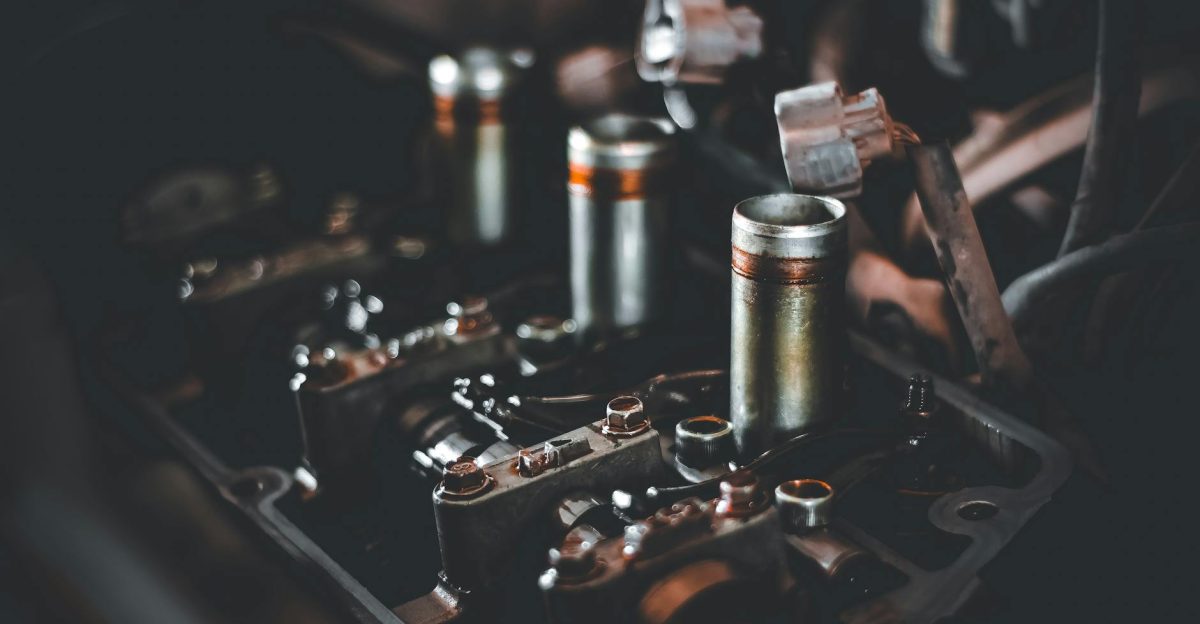 Detailed view of engine parts showcasing camshaft and cylinder head mechanics