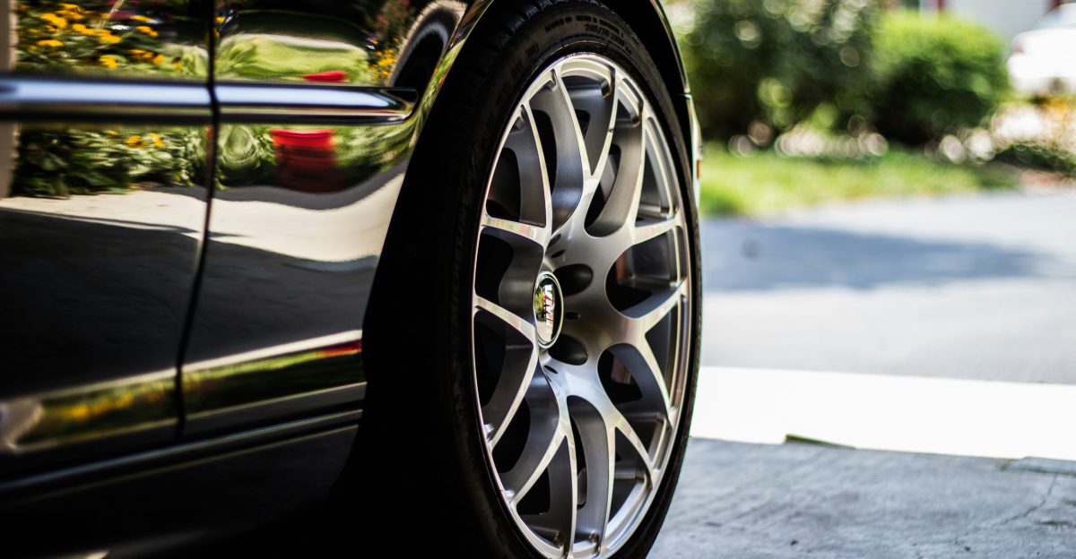 gray vehicle rim with tire