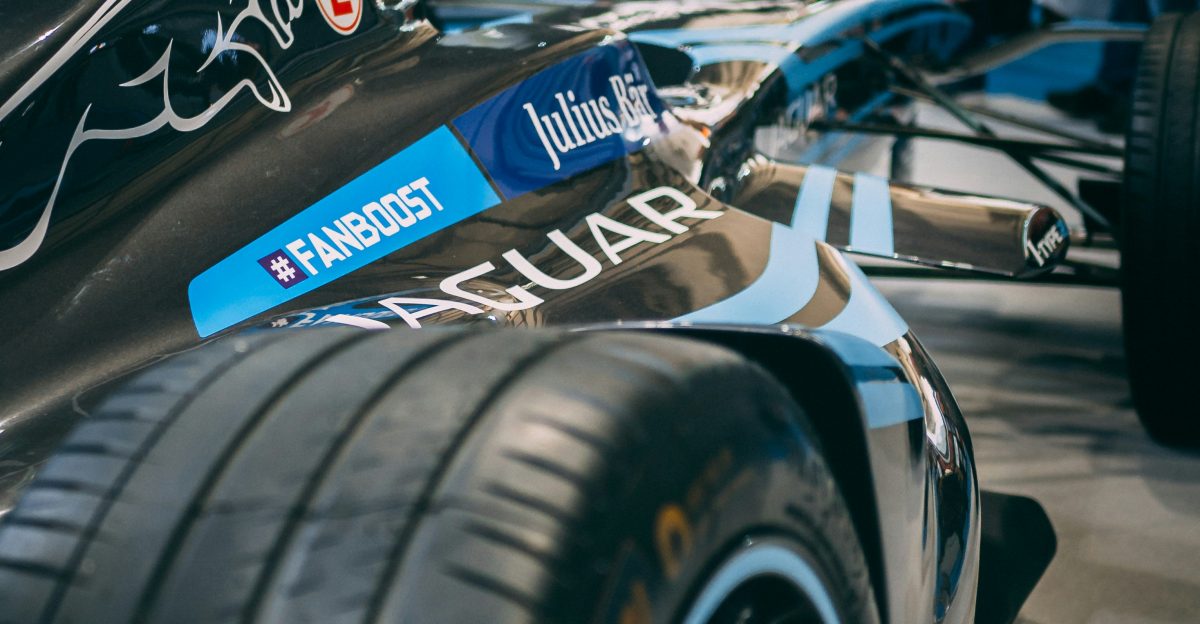 selective focus photography of parked racecar