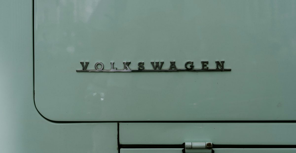 a close up of the word volkswagen on the side of a white
