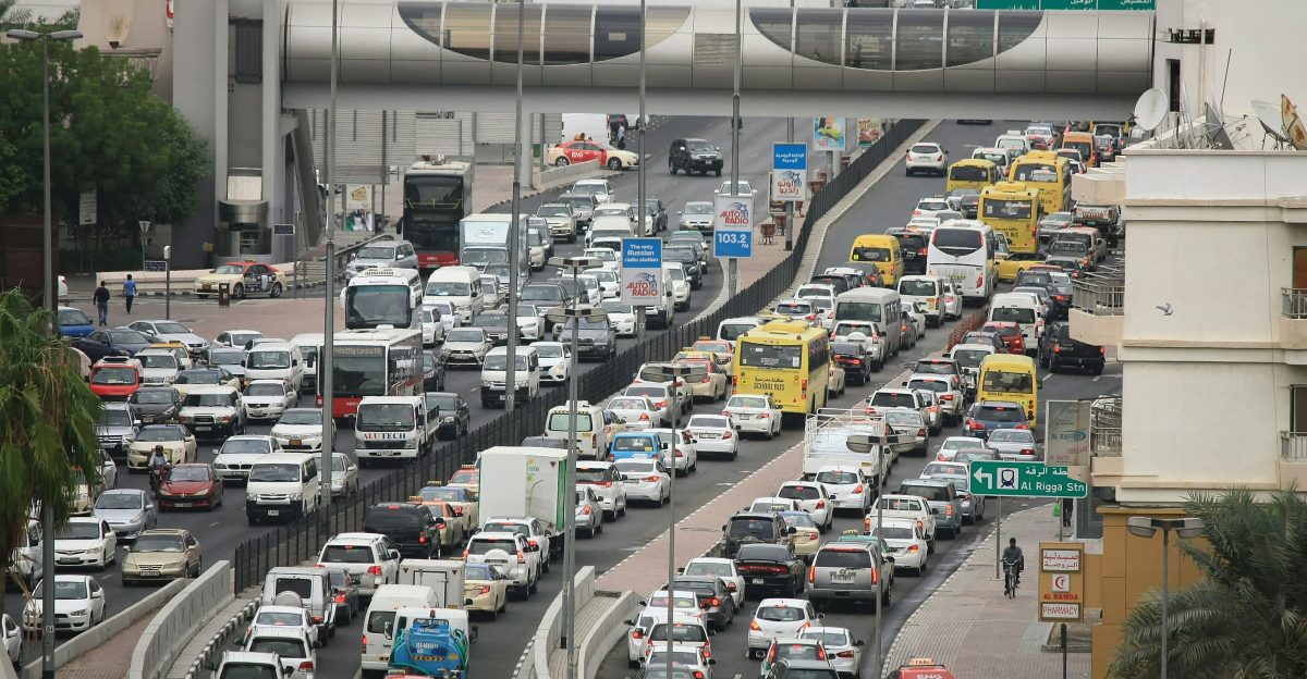 vehicles on road at daytime selective photography