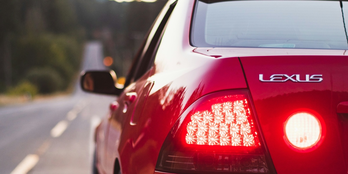 a red car parked on the side of the road