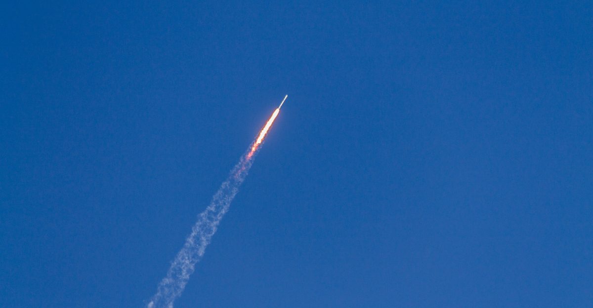 flying rocket during daytime