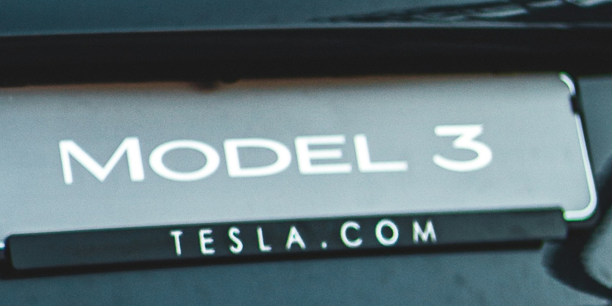 black Tesla Model 3 car