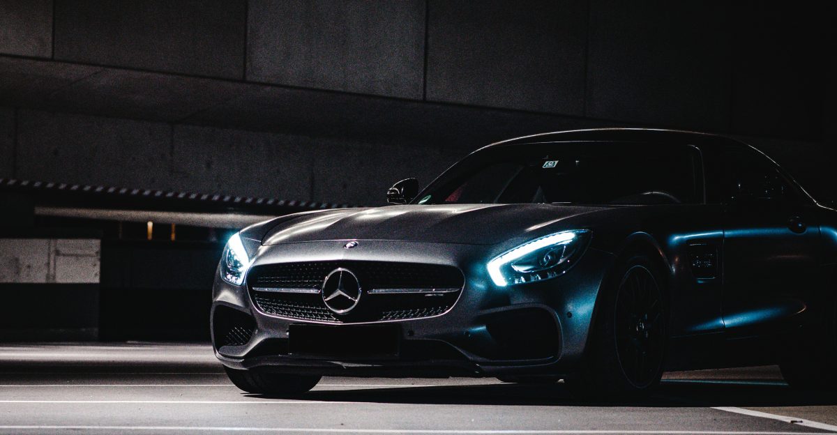 black porsche 911 parked on parking lot