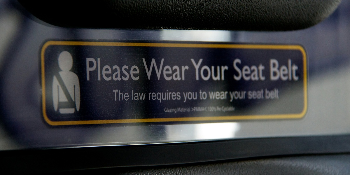 black and gold box on black leather textile