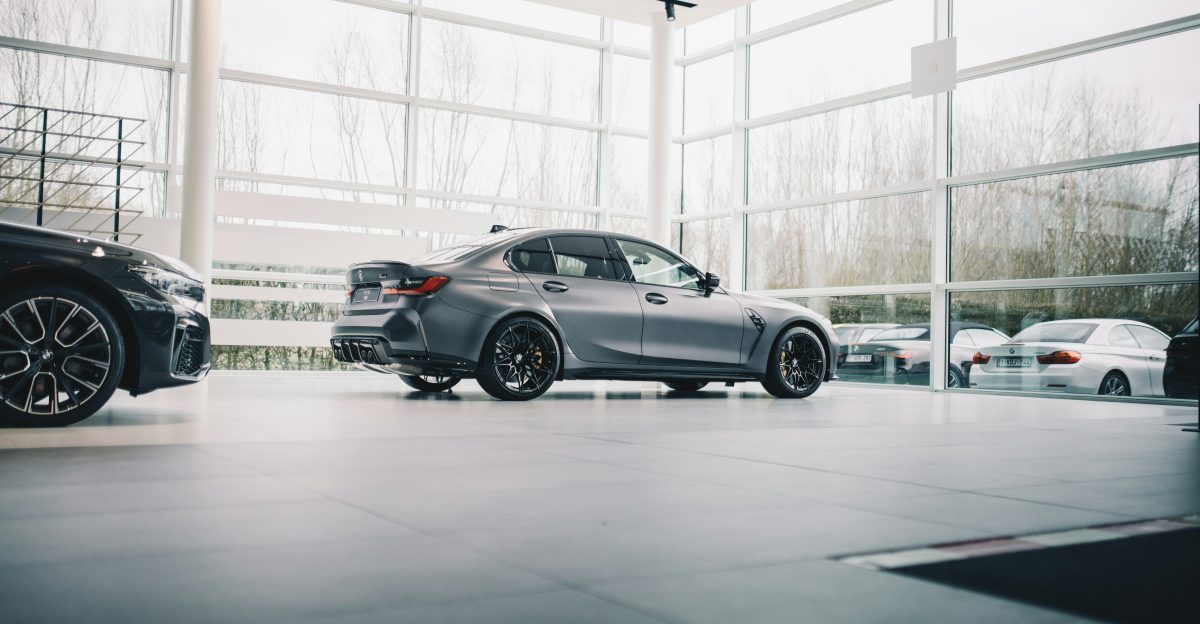 black coupe parked in a building