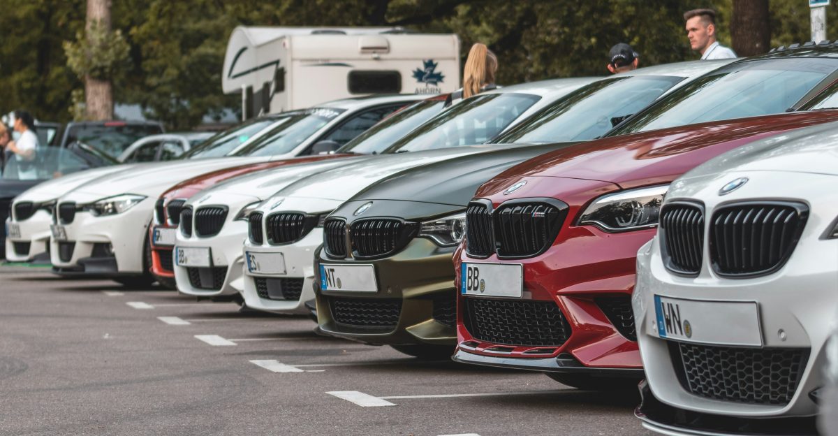 white and red bmw m 3 coupe on road during daytime