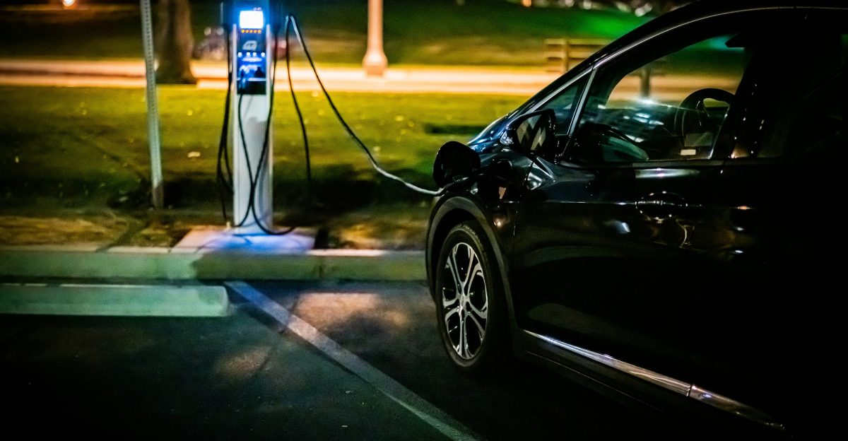 black car on parking lot during daytime