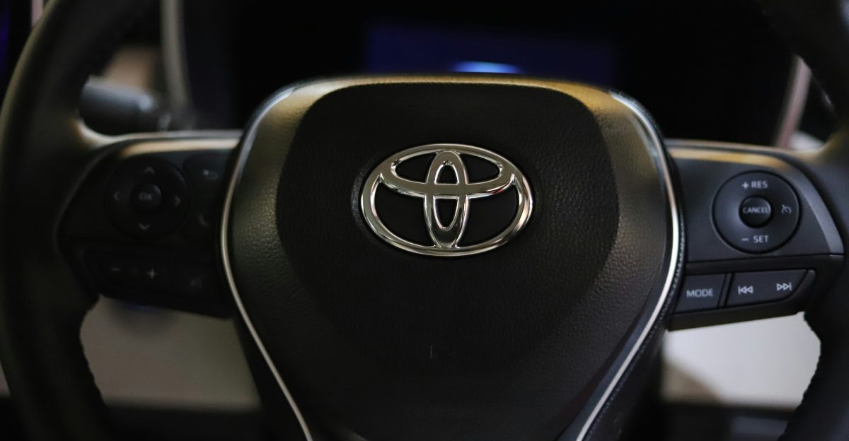 a close up of a steering wheel of a car