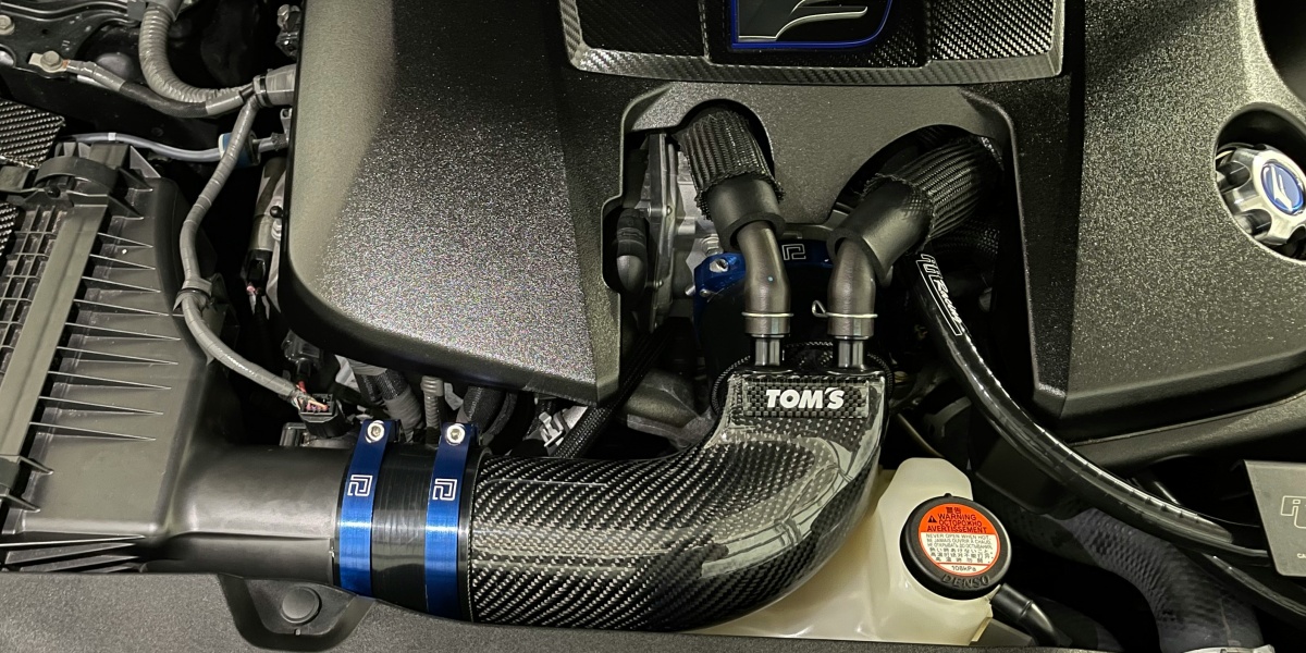 the engine compartment of a car with the hood up