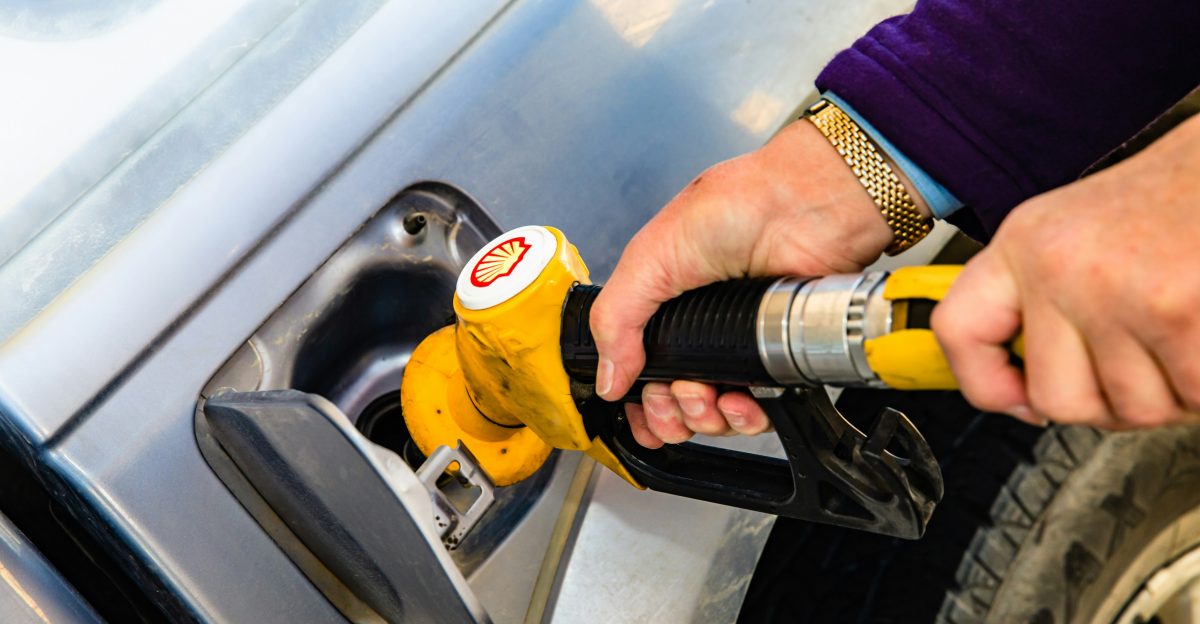 a person holding a drill