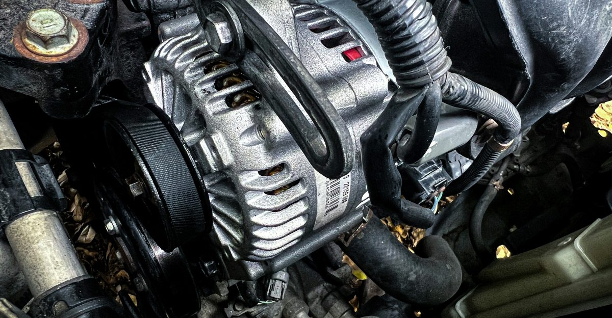 a car engine with a black hood