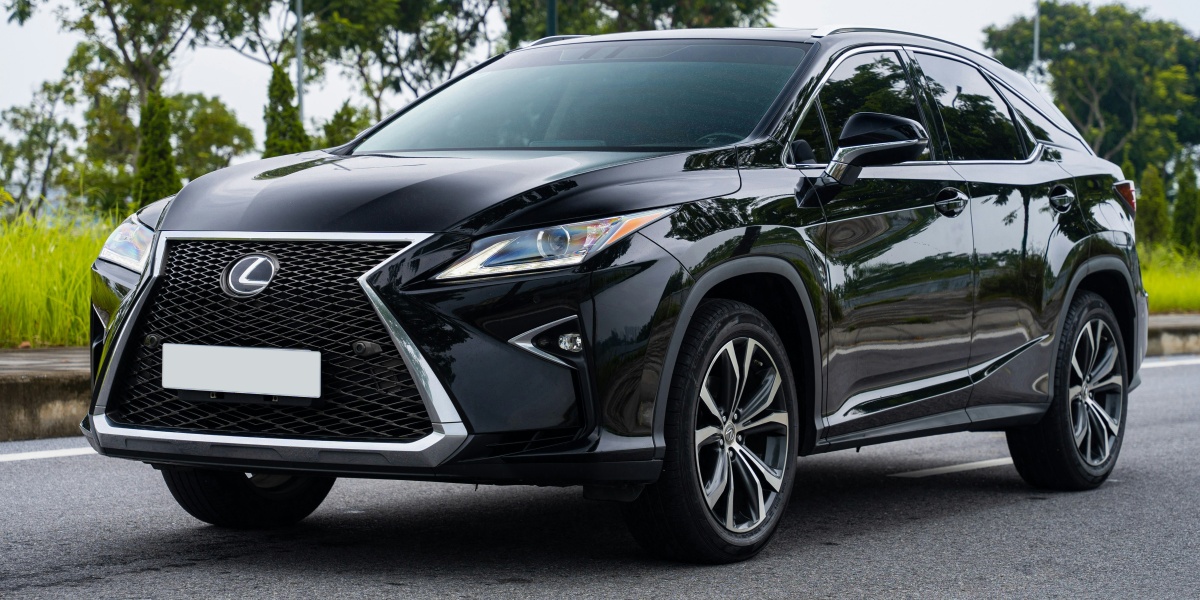 a black car parked on a road