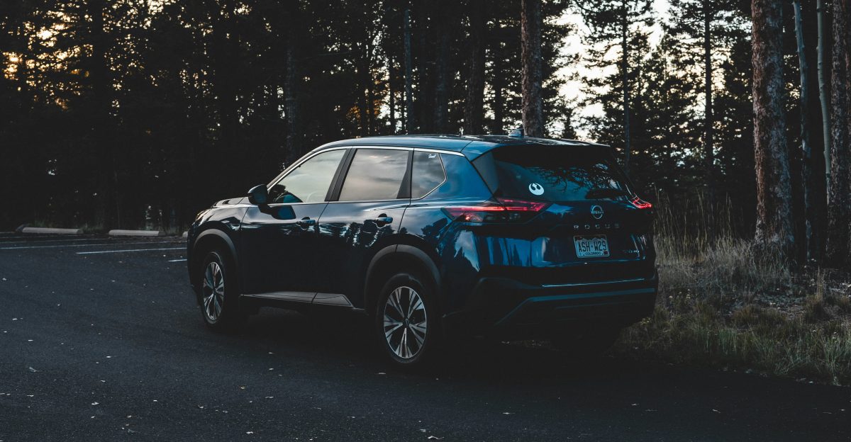 a car parked in a wooded area