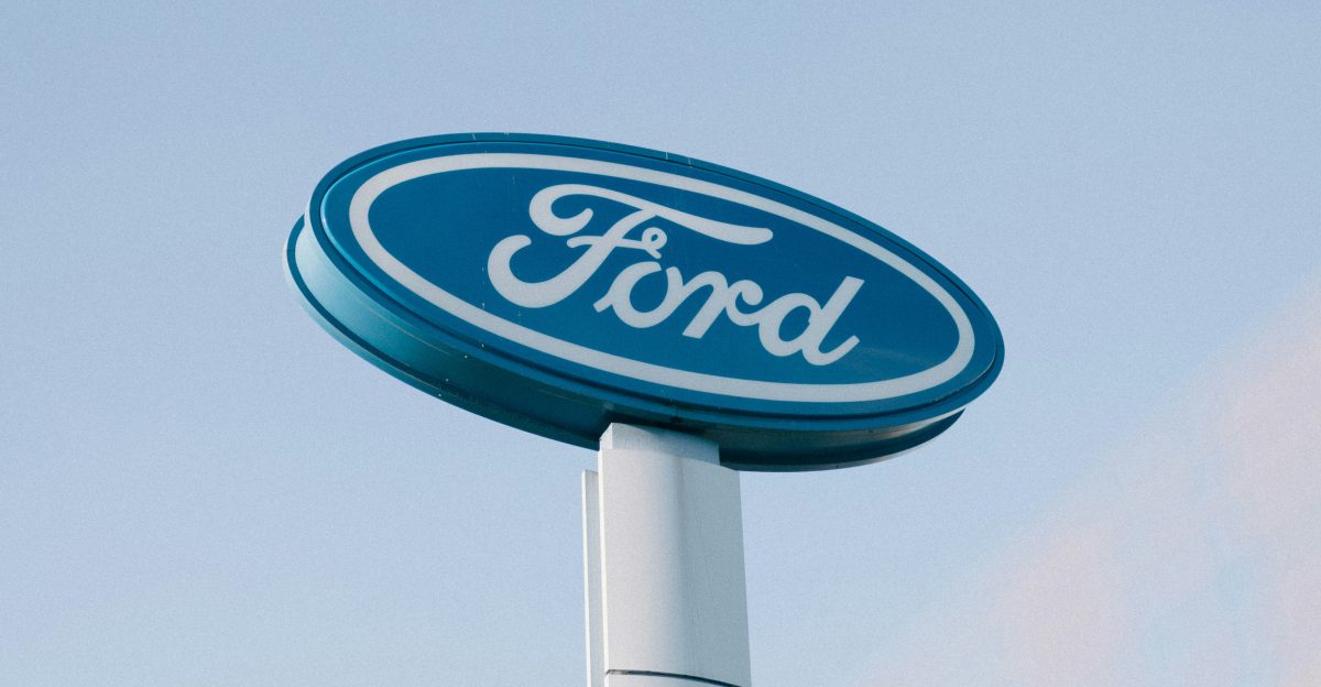 a ford sign is shown against a blue sky