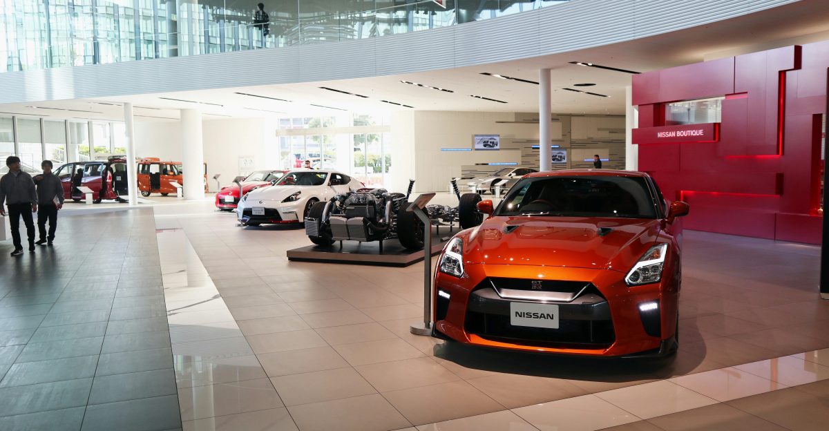 a car showroom filled with lots of cars