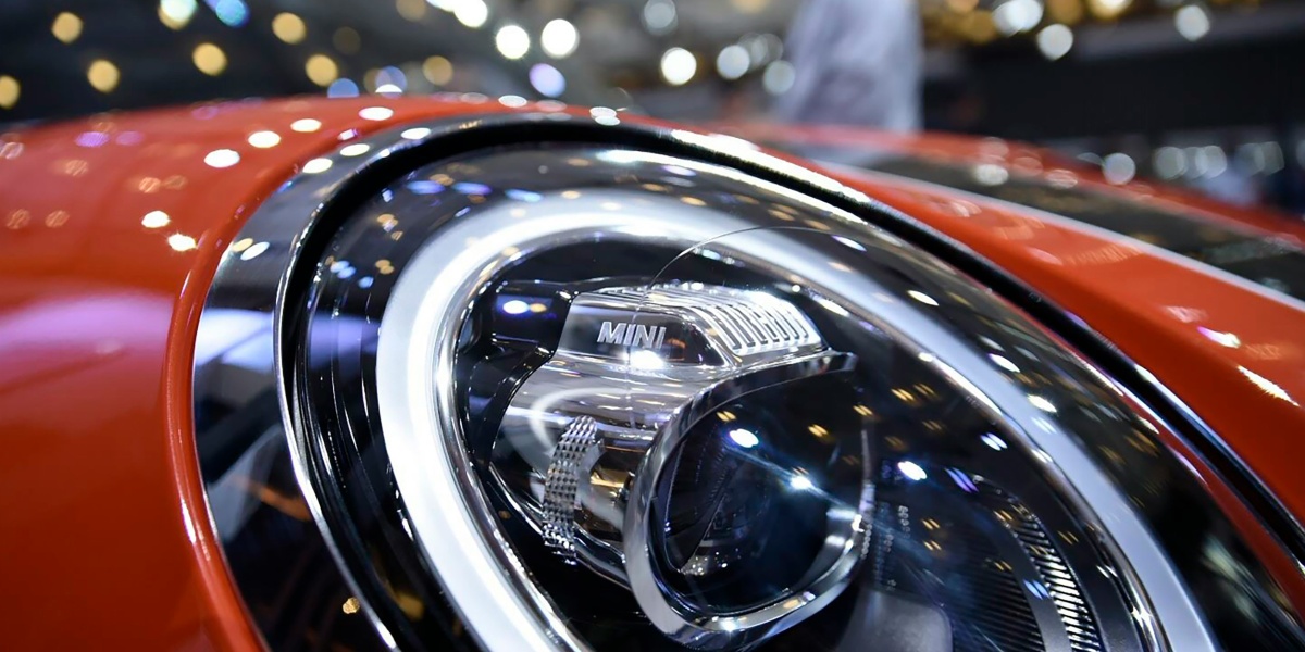 a close up of a car headlight on a vehicle