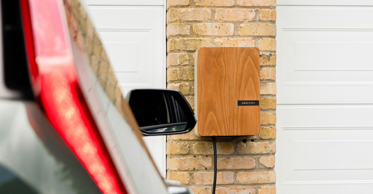 A car parked in front of a brick building