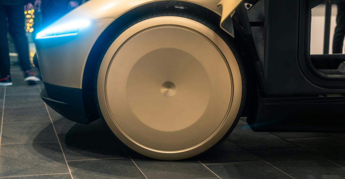 A close up of a robot on a tiled floor