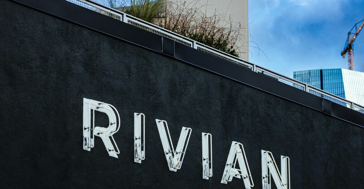 The rivian logo is displayed on a building