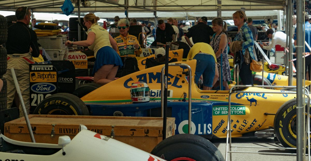 Race car pit stop with crew members working