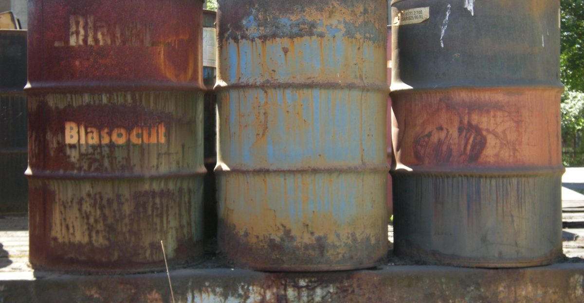Barrels left over from vehicle lube photographed at All Metal Co Georgetown Seattle Washington
