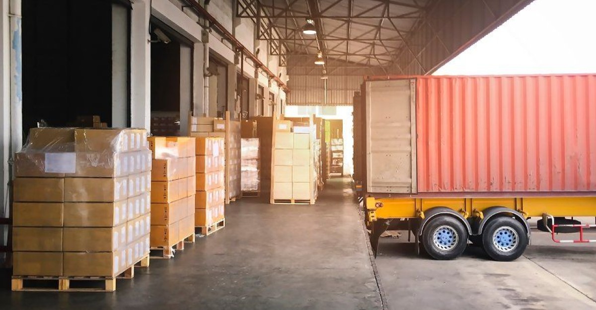 Shipping Cargo Container Trailer Truck Parked Loading Package Boxes at Dock Warehouse Cargo Shipment Supply Chain Industry Freight Truck Transportation Shipping Warehousing Logistics by Alfonso Valbuena