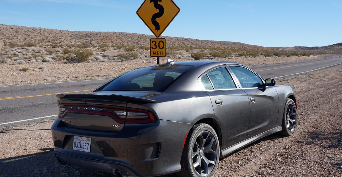 nevada desert auto car muscle car car wallpapers dodge charger r t nature winding road sign speed advisory