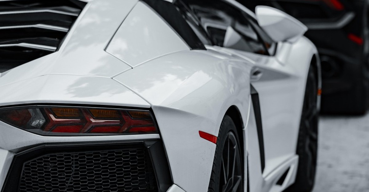 cars super cars luxury cars lamborghini corvette black car white car sports cars exotic cars daytime parked cars car row black lamborghini white lamborghini black corvette high-end vehicles automobile car collection outdoor